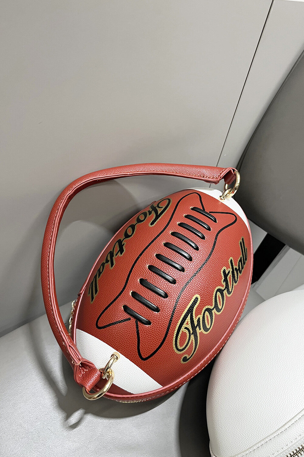 Letter Colorblock Print Zipper American Football Shaped Handbag